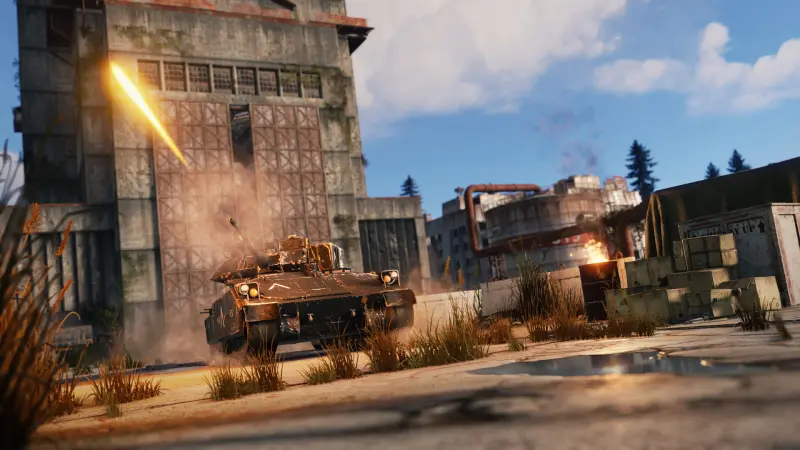 A Bradley-style armored vehicle firing at a ruined military building in Rust